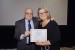 Dr. Nagib Callaos, General Chair, giving Dr. Lorayne Robertson an award certificate in appreciation for his presentation oriented to inter-disciplinary communication entitled: "The Influence of Tradition, Context, and Research in Doctoral Degree Design."